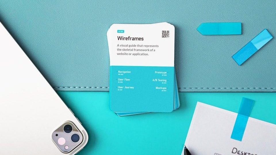 a laptop computer sitting on top of a desk